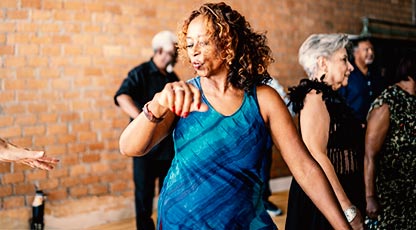 People enjoying themselves at a dance class