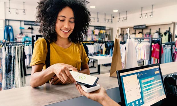 Person paying with a phone